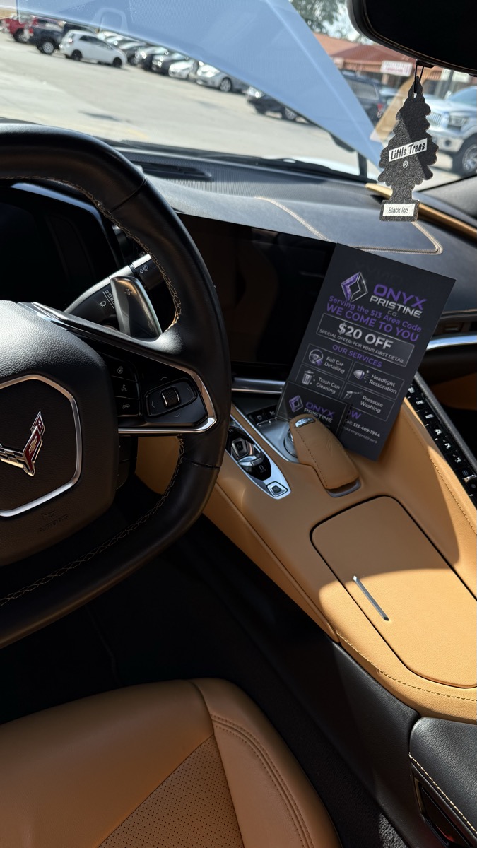 Clean Corvette interior with Onyx Pristine card