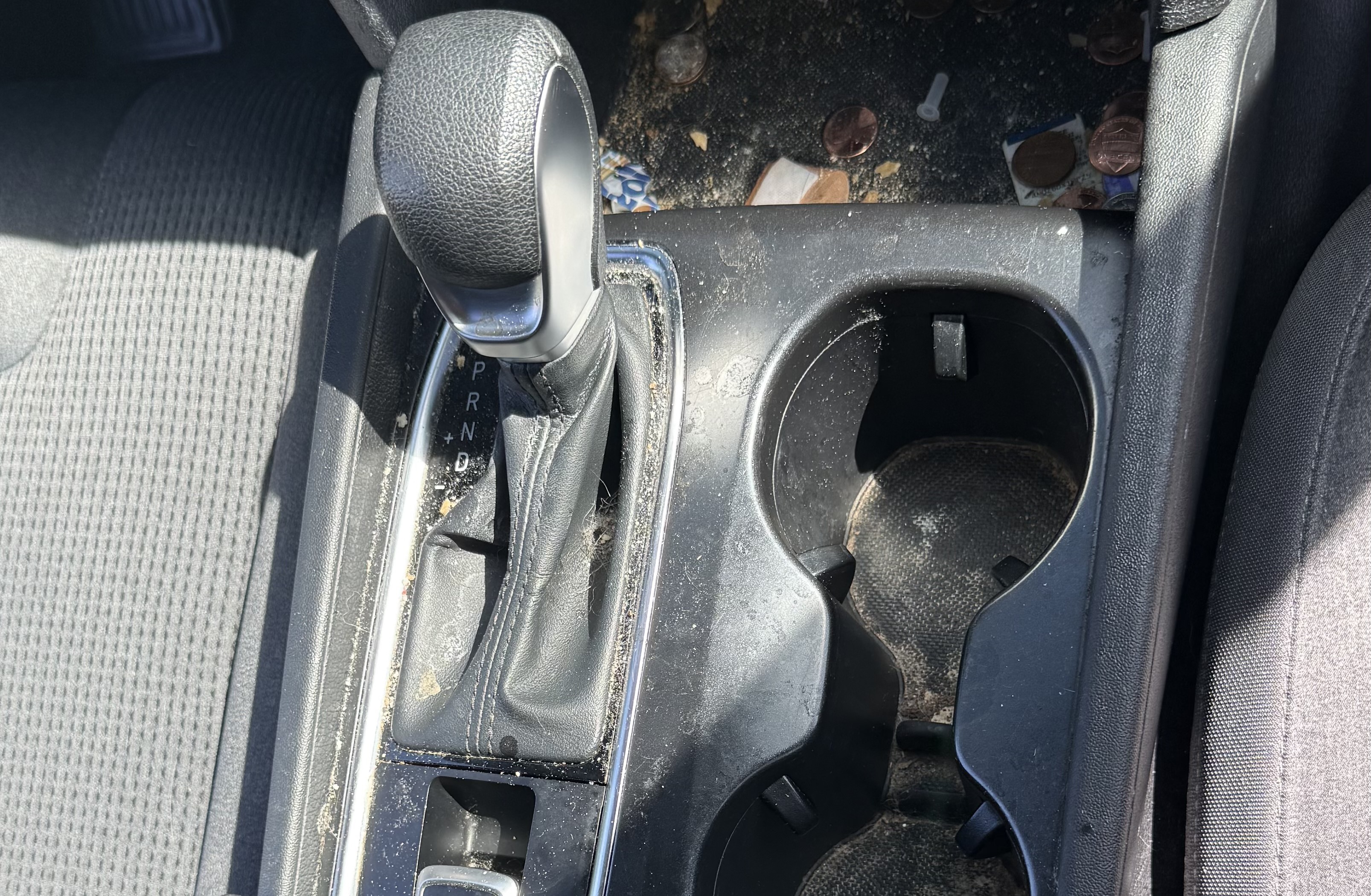 A grimy console before detailing in Mariemont