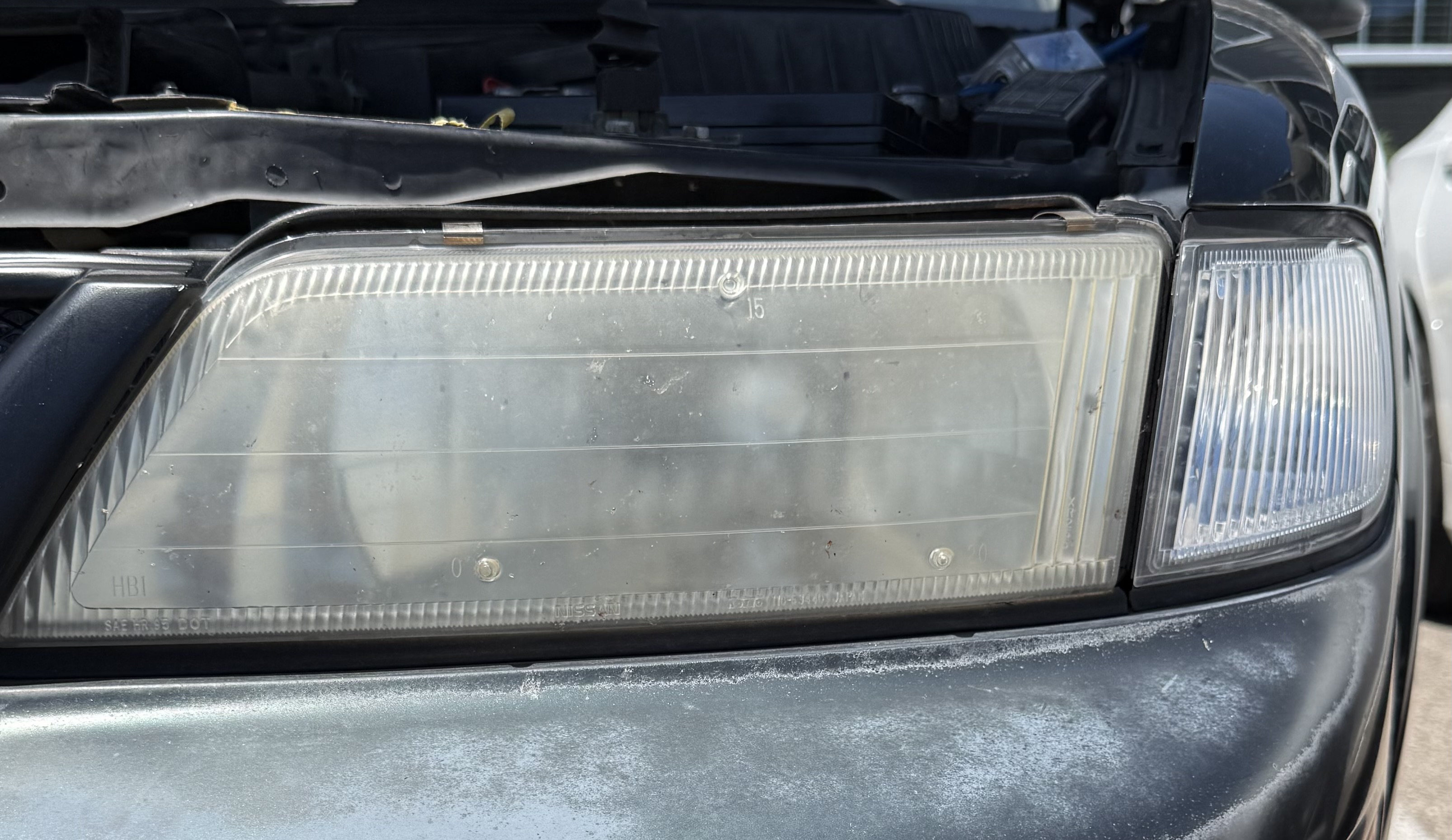 Hazy oxidized headlight before restoration Cincinnati