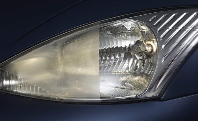 Cloudy, yellowed headlight before professional restoration