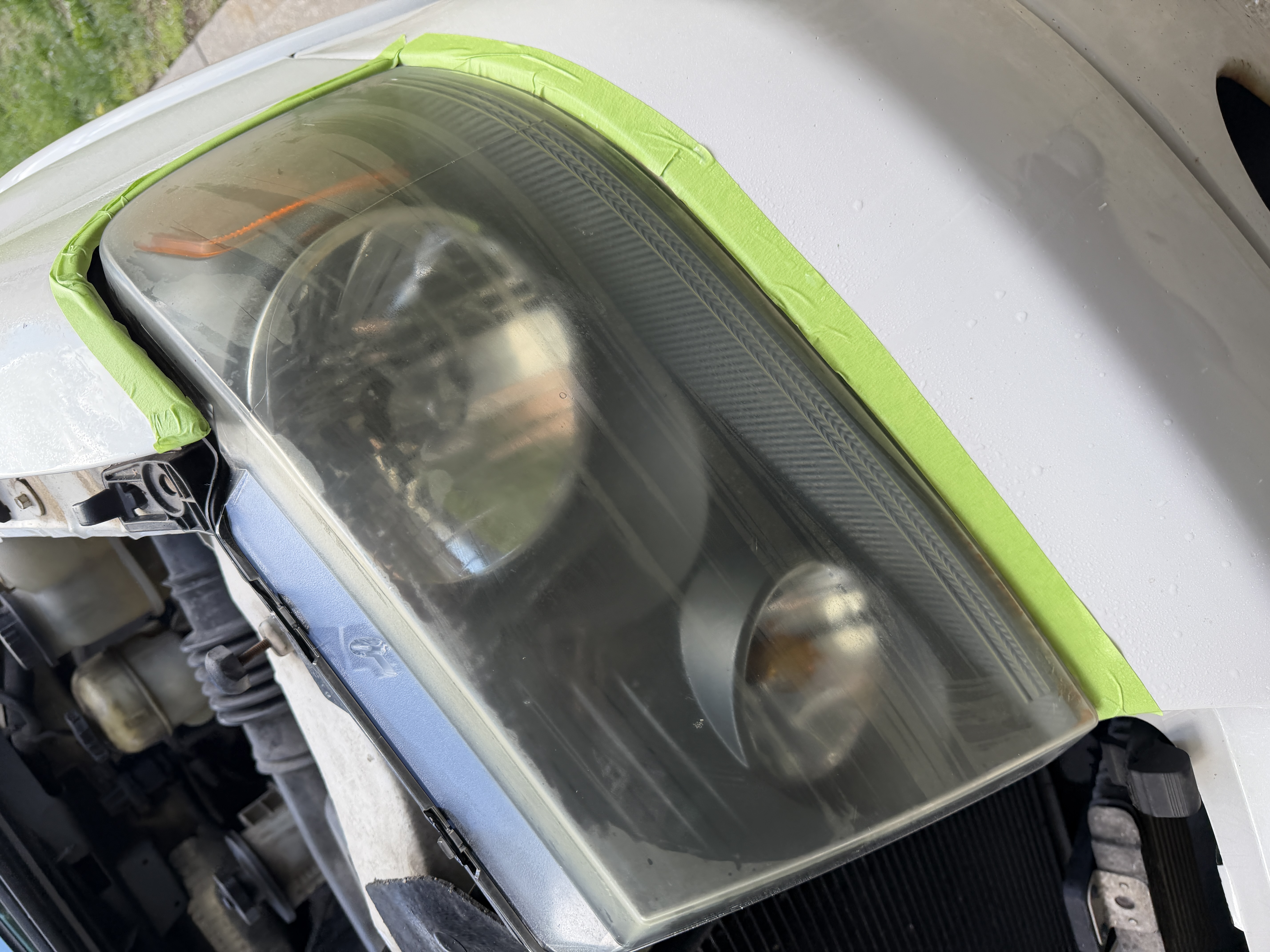 Foggy oxidized headlight before restoration process