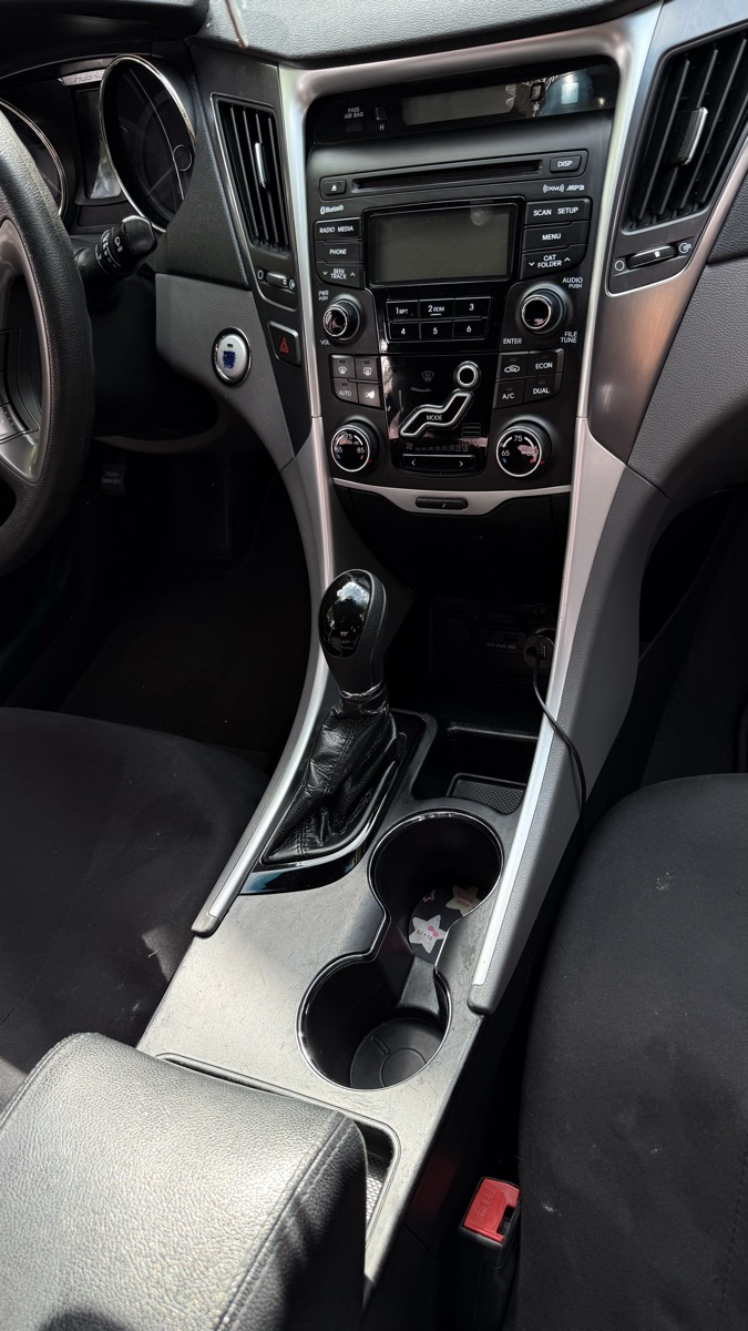 Clean car console after detail