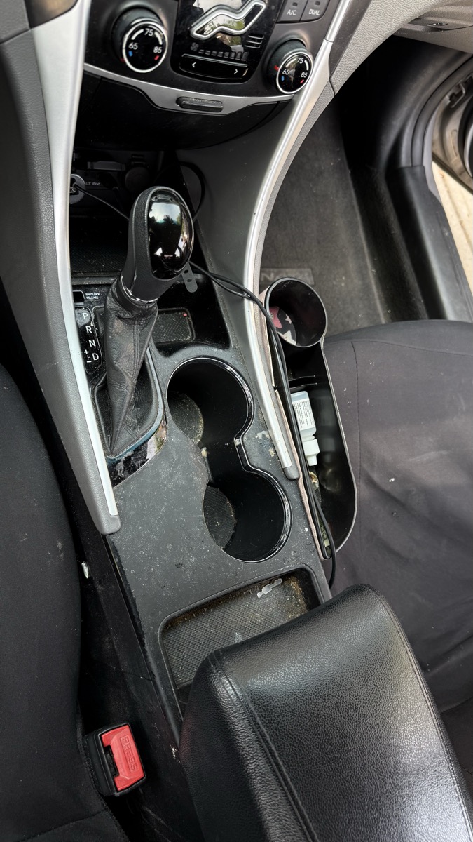 Dirty car console before detail