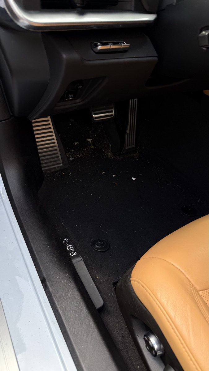 Dirty car floor before detail