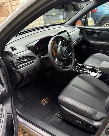 Subaru Forester Wilderness front seats and mats after an interior detail