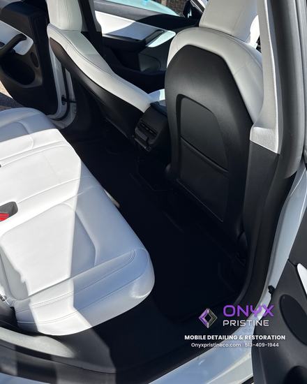 Tesla white leather rear bench after an interior detail